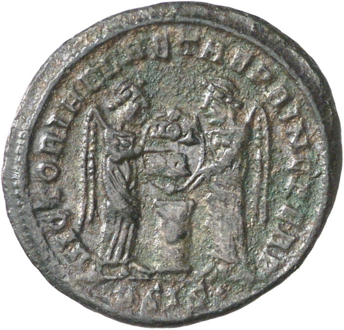 RIC VII Siscia 61 Constantine I reverse, Two Victories, winged, draped, facing each other, holding a shield inscribed VOT/...