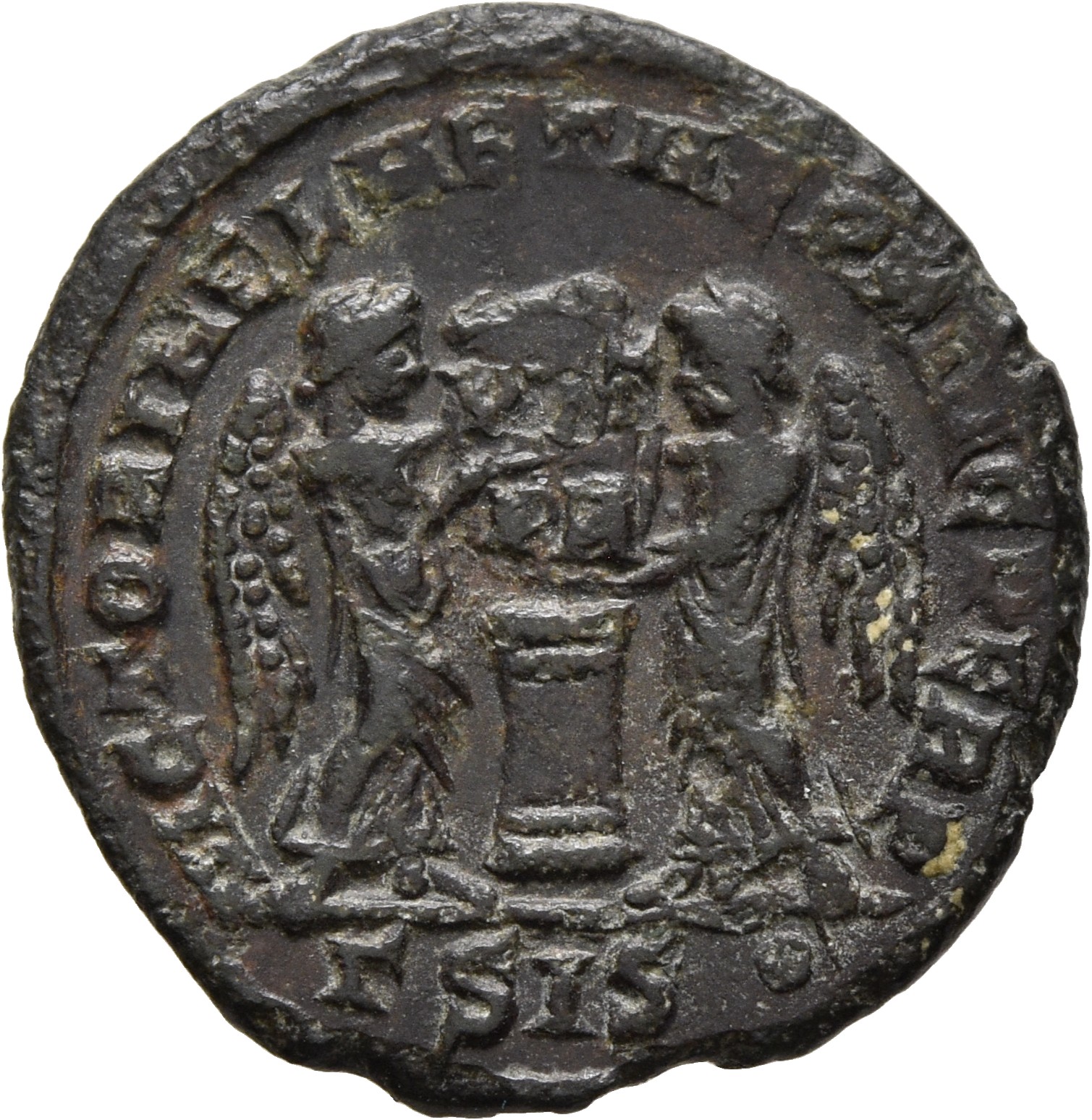 RIC VII Siscia 62 Constantine I reverse, Two Victories, winged, draped, facing each other, holding a shield inscribed VOT/...