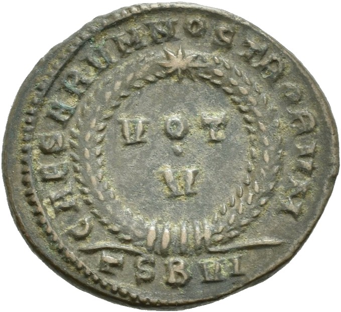 RIC VII Thessalonica 120 Constantine I reverse — VOT/V within a laurel wreath