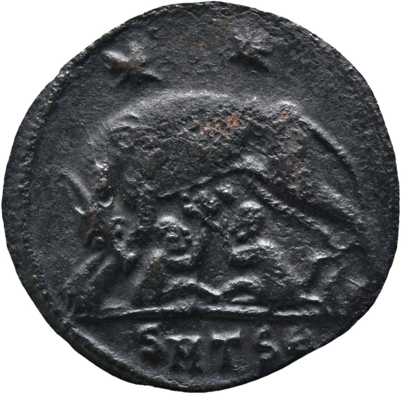 RIC VII Thessalonica 187 Constantine I reverse — She-wolf, standing left, suckling twins; above, two stars