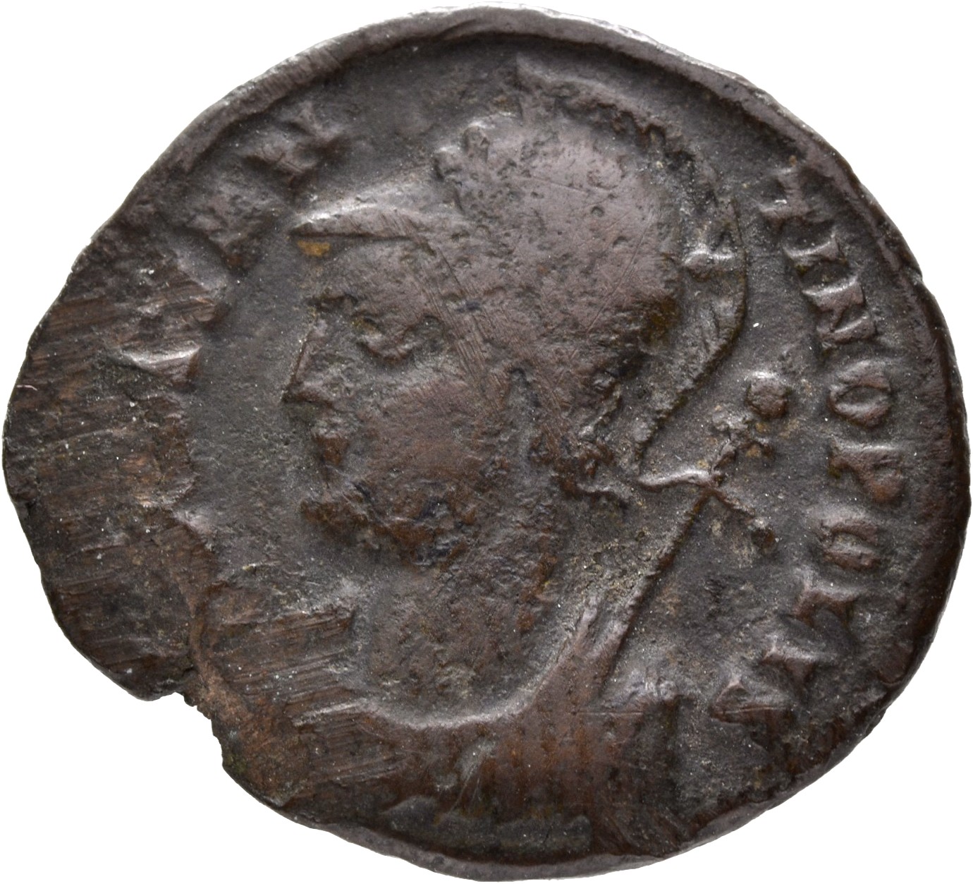 Constantine I obverse — Bust of Constantinopolis, laureate, helmeted, wearing imperial cloak, left, holding reversed spear in right hand