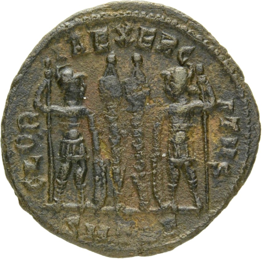 RIC VII Thessalonica 200 Constantine I reverse, Two soldiers, helmeted, draped, cuirassed, standing facing each other, eac...