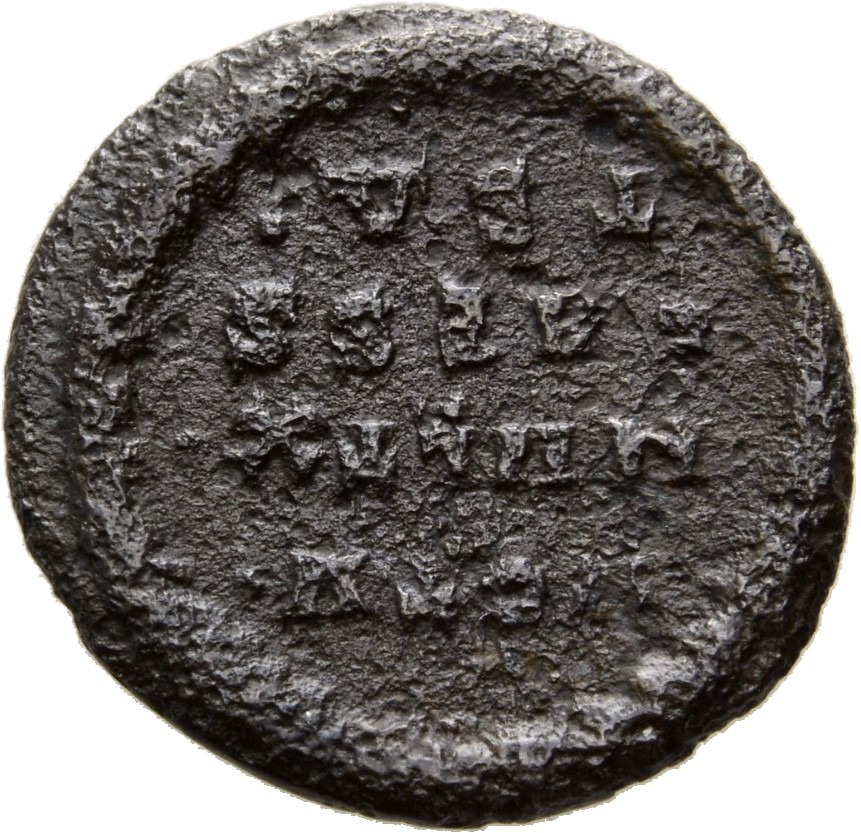 Constantine I reverse — VOT •V•/MVLT •X•/CAESS within laurel wreath with mint mark