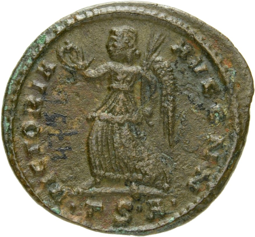 Constantine I reverse — Victory, winged, draped, advancing left, holding wreath in right hand and palm in left hand