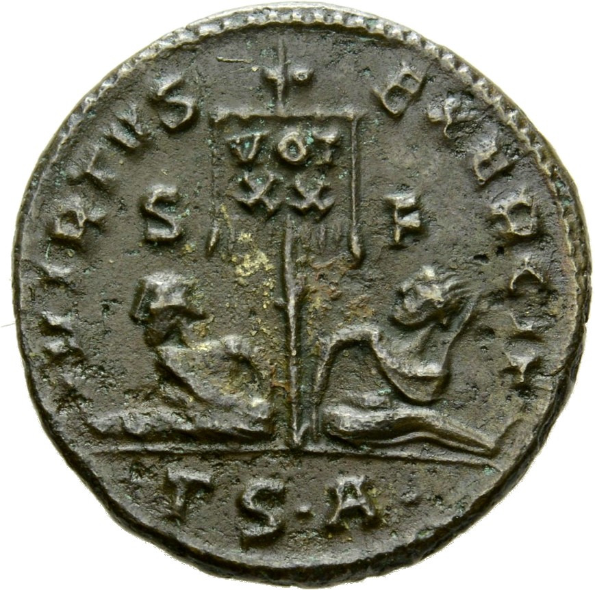 Constantine I reverse — Standard inscribed VOT/XX flanked by two seated captives