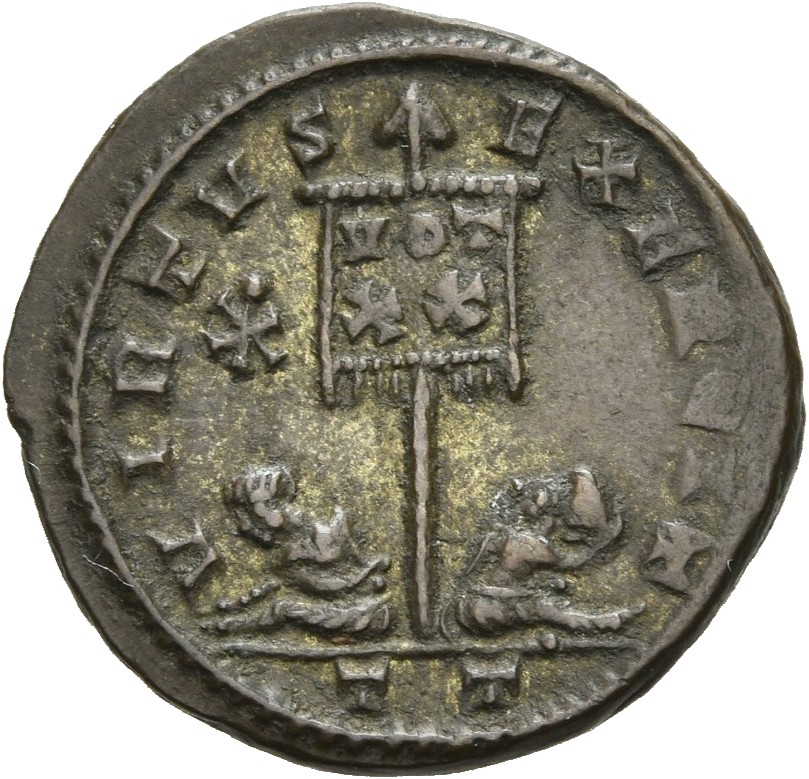 RIC VII Ticinum 119 Constantine I reverse, Standard with VOT/XX inscribed on drapery, flanked by two seated captives