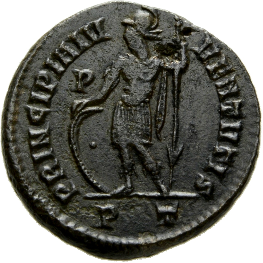 Constantine I reverse — Crispus, helmeted, draped, cuirassed, chlamys draped across left shoulder, standing left, placing right hand on shield and holding reversed spear in left hand
