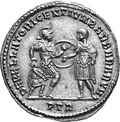 Constantine I reverse — Constantine I, draped, cuirassed, standing left, raising right hand towards soldier with shield and dragging captive by hair with right hand