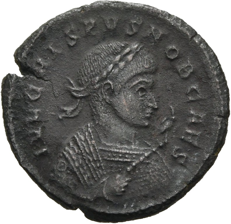 RIC VII Treveri 399 Constantine I obverse, Bust of Crispus, laureate, wearing trabea, right, holding eagle-tipped sceptre ...