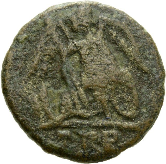 RIC VII Treveri 523 Constantine I reverse, Victory, winged, draped, standing left on prow, holding spear in right hand and...