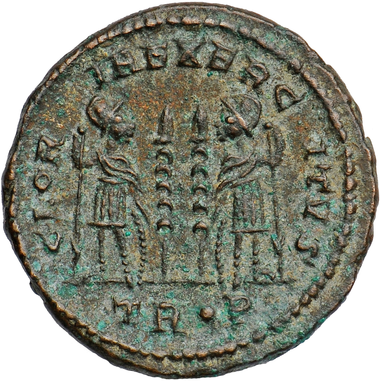 RIC VII Treveri 538 Constantine I reverse, Two soldiers, helmeted, draped, cuirassed, standing facing each other, each hol...
