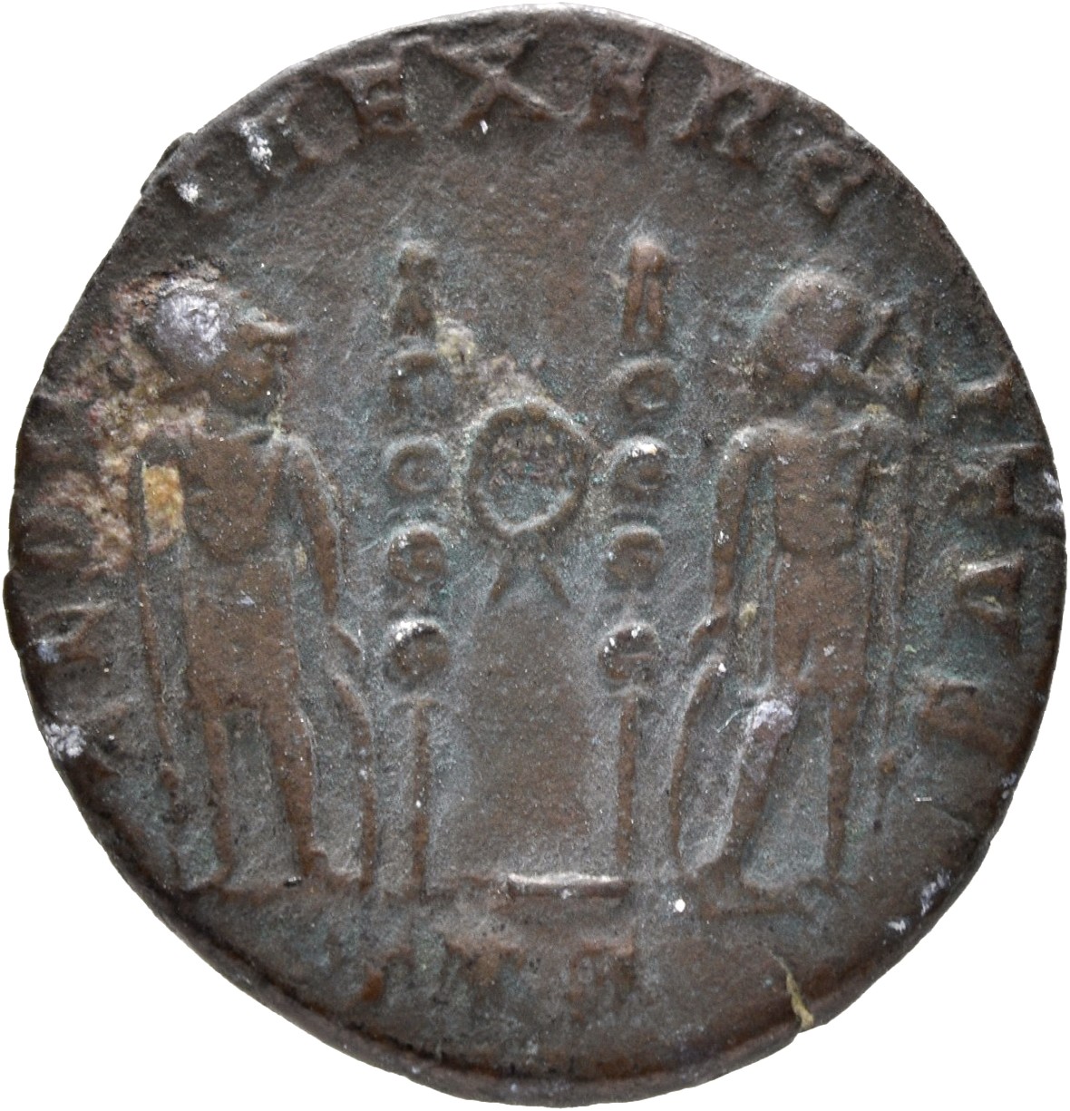 RIC VII Treveri 550 Constantine I reverse, Two soldiers, helmeted, draped, cuirassed, standing facing each other, each hol...