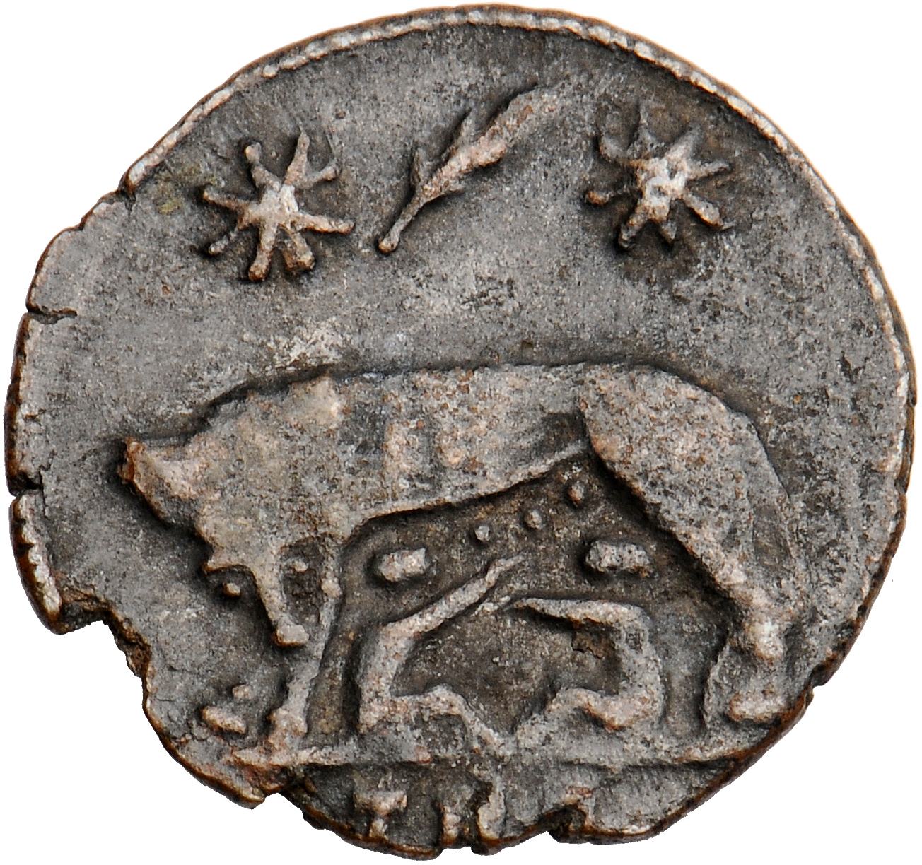 RIC VII Treveri 561 Constantine I reverse, She-wolf, standing left, suckling twins; above, two stars