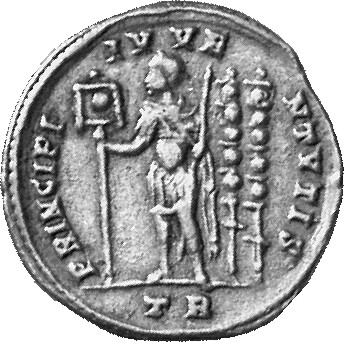 Constantine I reverse — Constans, draped, cuirassed, standing left, holding vexillum in right hand and sceptre in left hand; behind him, two standards