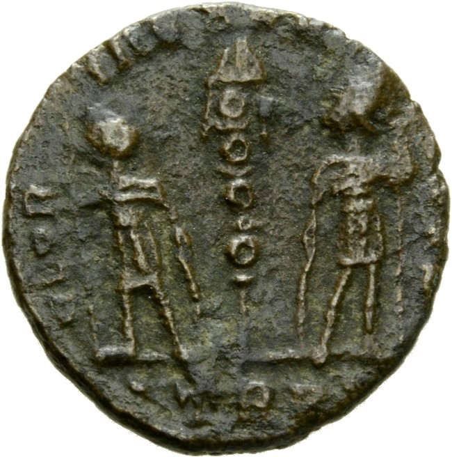 RIC VII Treveri 593 Constantine I reverse, Two soldiers, helmeted, draped, cuirassed, facing each other, holding a standar...