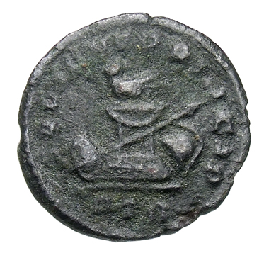 RIC VII Treveri 64 Constantine I reverse, Altar with bird, spear across altar; to left shield; to right, helmet