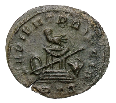 RIC VII Treveri 65 Constantine I reverse, Altar with bird, spear across altar; to left shield; to right, helmet