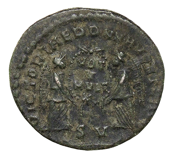RIC VIII Lugdunum 127 Magnentius reverse, Two Victories, winged, draped, standing facing each other, holding between them ...