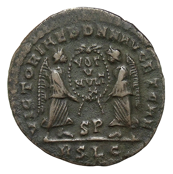 RIC VIII Lugdunum 137 Magnentius reverse, Two Victories, winged, draped, standing facing each other, holding between them ...