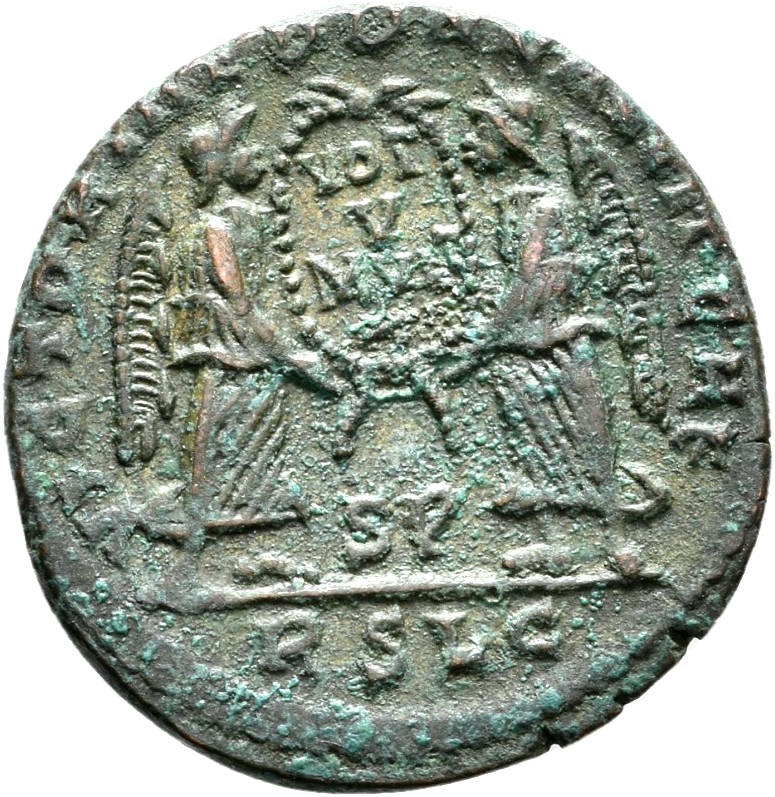RIC VIII Lugdunum 137 Magnentius reverse, Two Victories, winged, draped, standing facing each other, holding between them ...