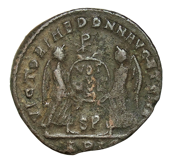 RIC VIII Lugdunum 145 Magnentius reverse, Two Victories, winged, draped, standing facing each other, holding between them ...