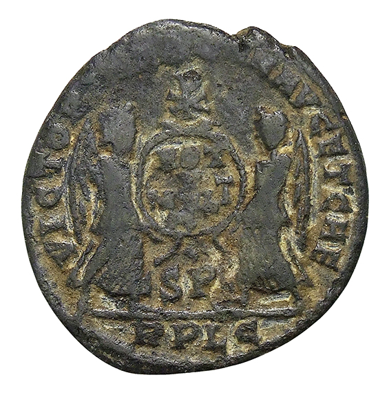 RIC VIII Lugdunum 145 Magnentius reverse, Two Victories, winged, draped, standing facing each other, holding between them ...
