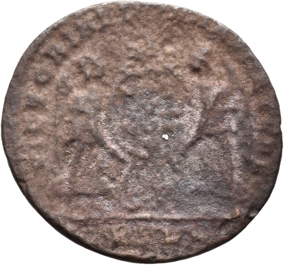 RIC VIII Lugdunum 146 Magnentius reverse, Two Victories, winged, draped, standing facing each other, holding between them ...