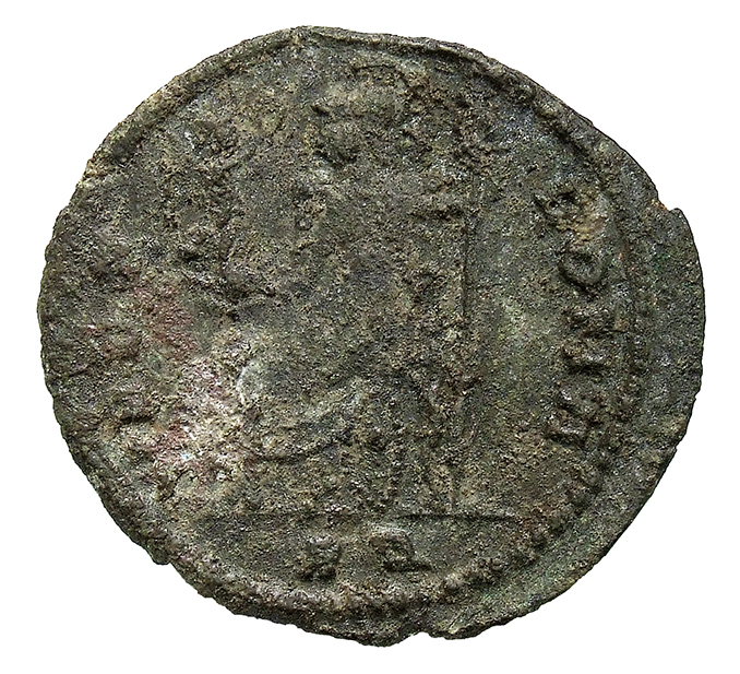 RIC VIII Rome 206 Magnentius reverse, Roma, helmeted, draped, seated left on throne, holding Victory on globe in right han...