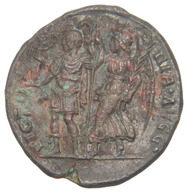 RIC VIII Rome 412 Magnentius reverse, Magnentius, draped, cuirassed, standing left, holding Victory on globe in right hand...