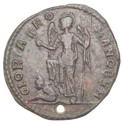 RIC VIII Rome 414 Magnentius reverse, Victory, helmeted, draped, standing left, holding branch in left hand and standard i...
