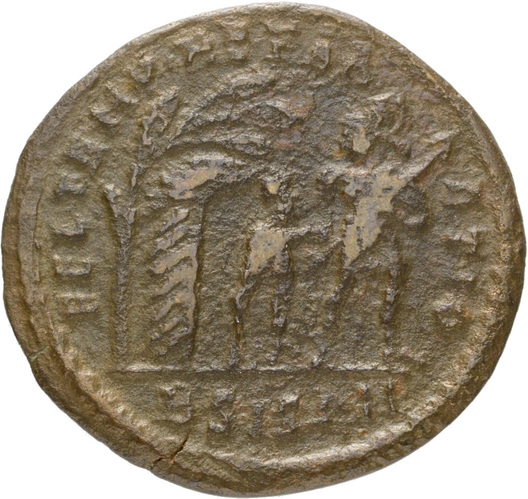 RIC VIII Siscia 218 Constans reverse — Soldier, helmeted, draped, cuirassed, advancing right, head left, leading small bar...