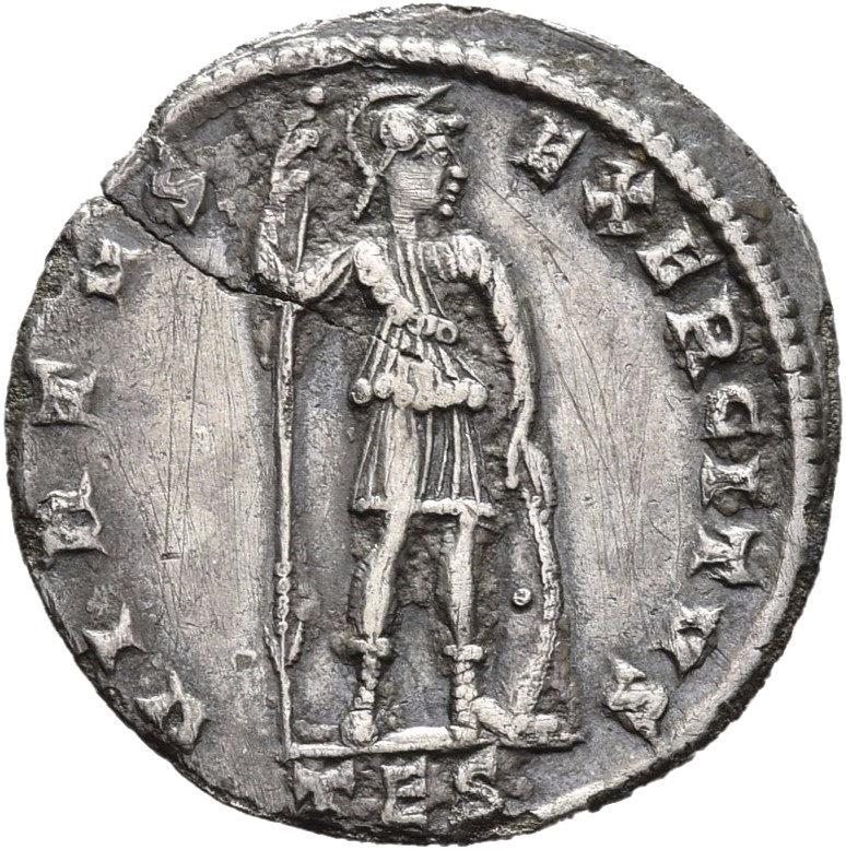 RIC VIII Thessalonica 160 Constantius II reverse, Soldier, helmeted, draped, cuirassed, standing front, head right, holdin...