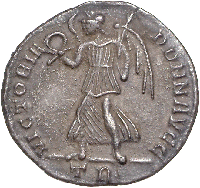 RIC VIII Treveri 176 Constans reverse — Victory, winged, draped, walking left, holding wreath in right hand and palm in le...