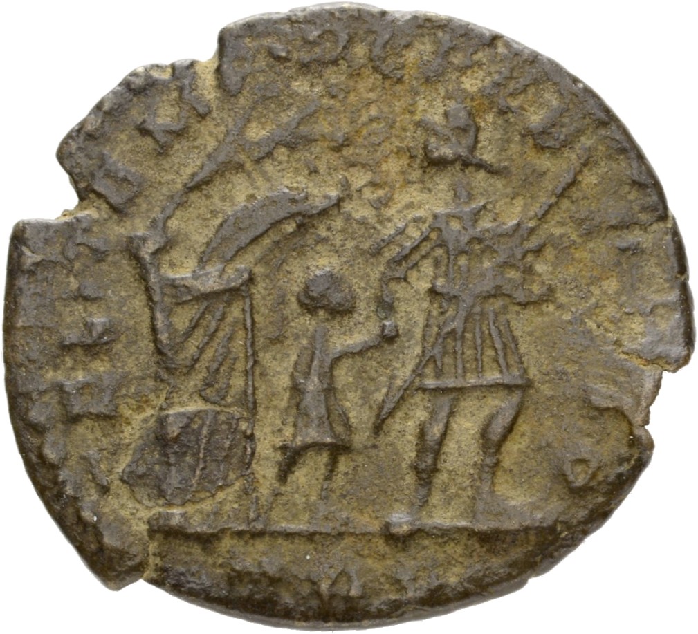 RIC VIII Treveri 221 Constans reverse, Soldier, helmeted, draped, cuirassed, advancing right, head left, leading small bar...