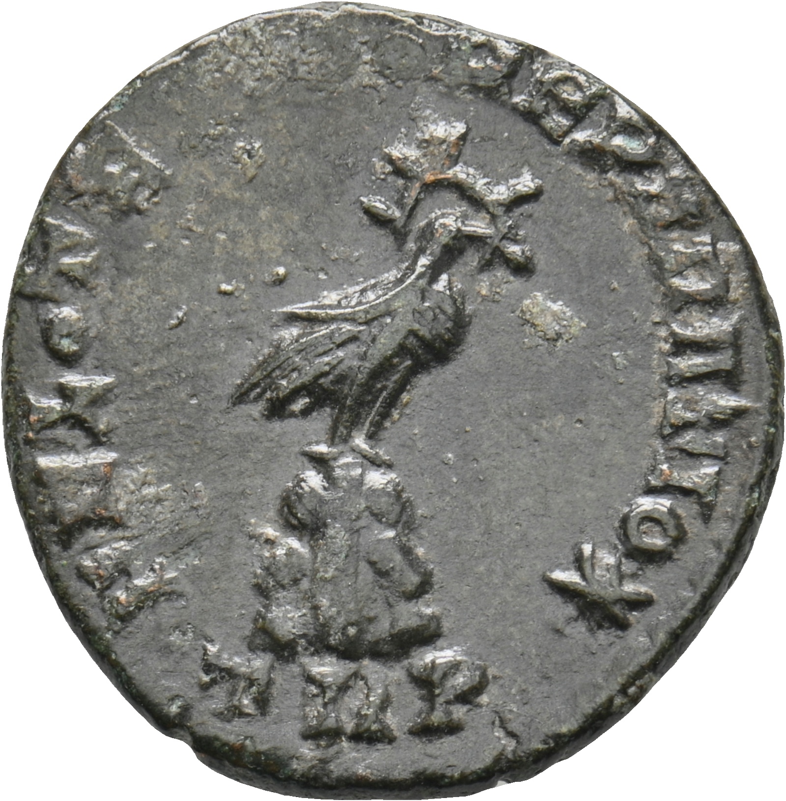 RIC VIII Treveri 227 Constans reverse, Phoenix, radiate, standing right on rocky mound