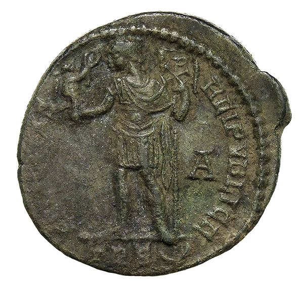 RIC VIII Treveri 266 Magnentius reverse, Magnentius, draped, cuirassed, standing left, holding Victory on globe in right h...