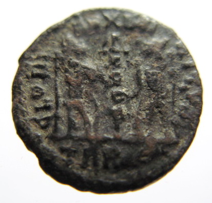 RIC VIII Treveri 81 Constantine II reverse, Two soldiers, helmeted, draped, cuirassed, facing front, heads toward each oth...