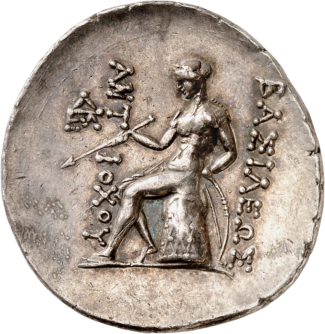 HOUGHTON Seleucid Coins (part 1) 1063 Antiochus III reverse, Apollo seated left on omphalos, testing arrow and resting lef...