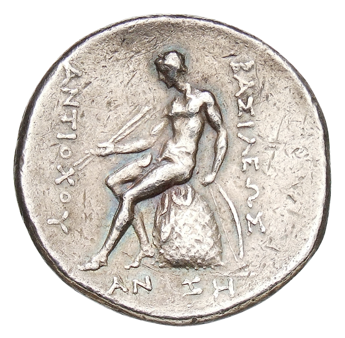 HOUGHTON Seleucid Coins (part 1) 324b Antiochus I reverse, Apollo wearing sandals, seated left on omphalos, holding two ar...