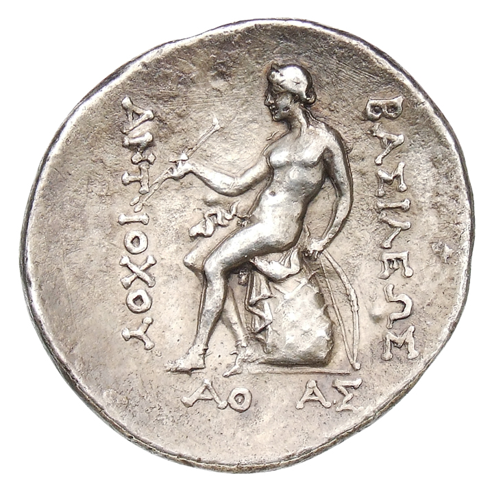 HOUGHTON Seleucid Coins (part 1) 324c Antiochus I reverse, Apollo wearing sandals, seated left on omphalos, holding two ar...