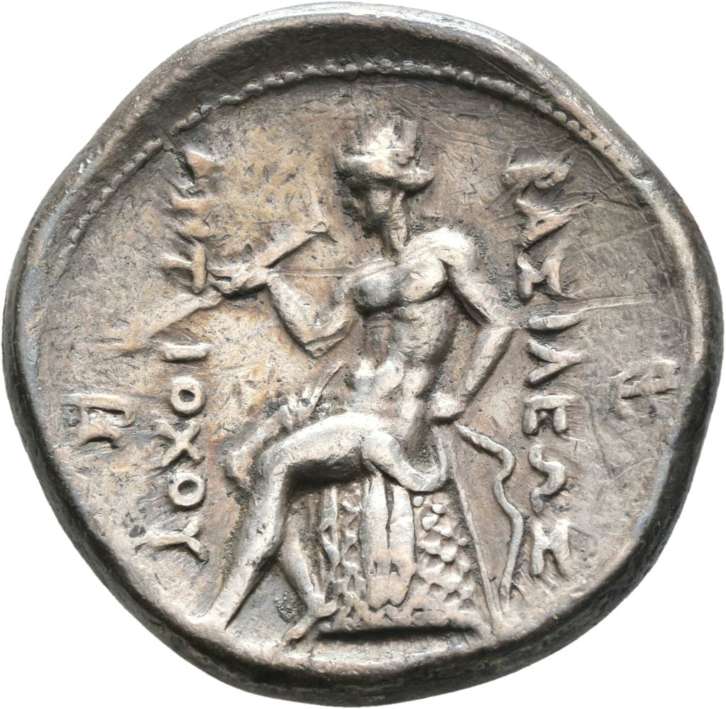 HOUGHTON Seleucid Coins (part 1) 378.3 Antiochus I reverse, Apollo seated left on omphalos, testing two arrows and resting...