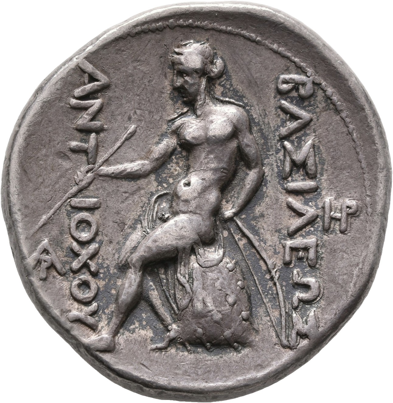 HOUGHTON Seleucid Coins (part 1) 379.3 Antiochus I reverse, Apollo seated left on omphalos, testing arrow and resting left...